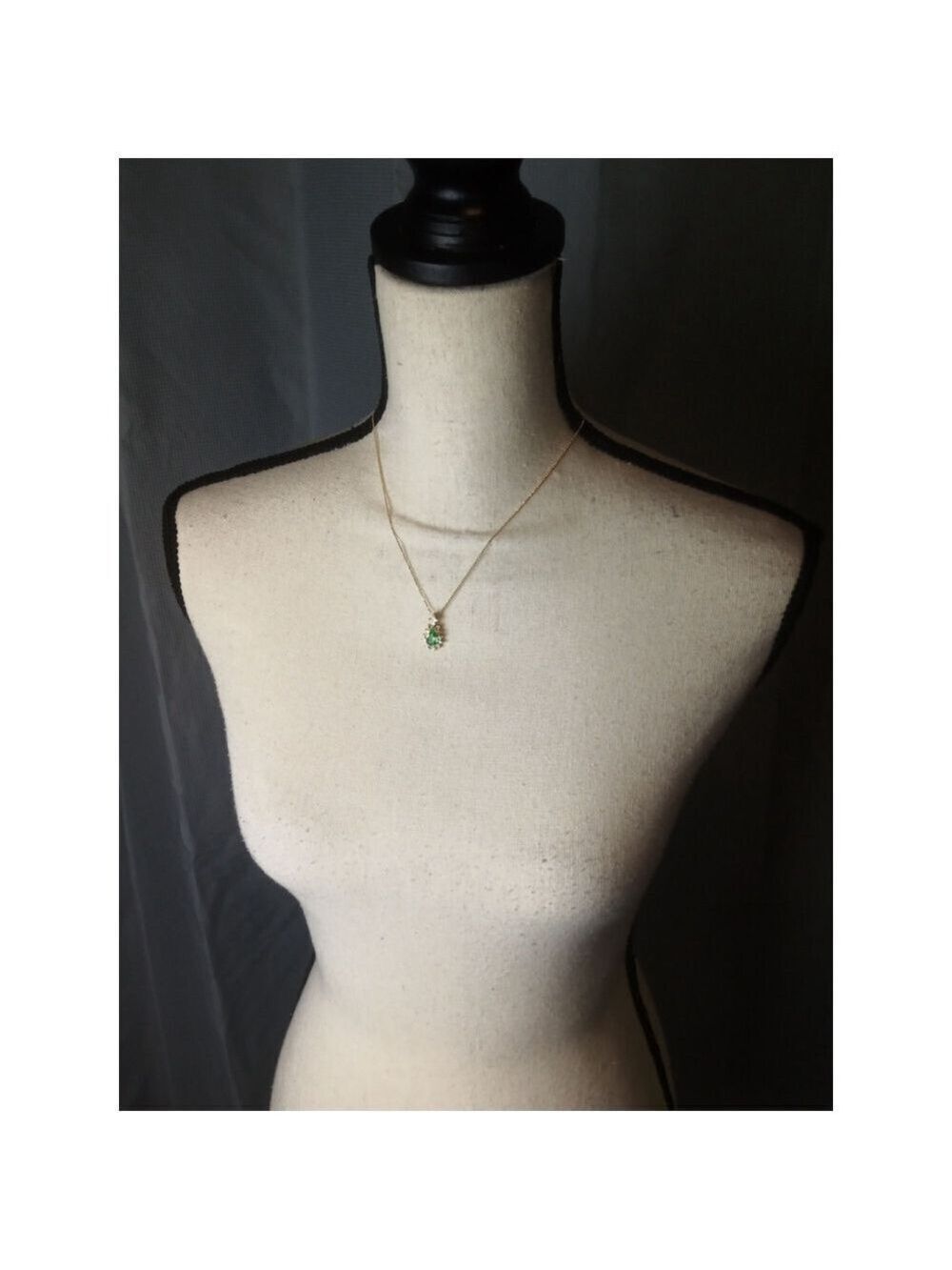 Necklace Gold Colored with Green and Clear Stones on a Teardrop Pendant